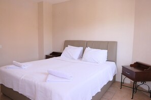 Huoneisto, 1 makuuhuone | Työpöytä, ilmainen Wi-Fi, vuodevaatteet