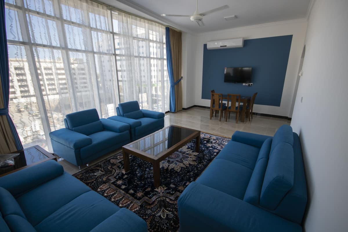 32-inch flat-screen TV with satellite channels, TV