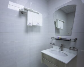 Shower, free toiletries, hair dryer, slippers