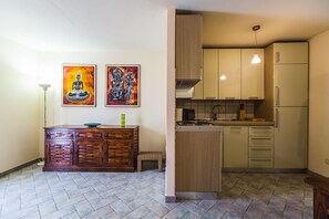 Fridge, stovetop, toaster, cookware/dishes/utensils