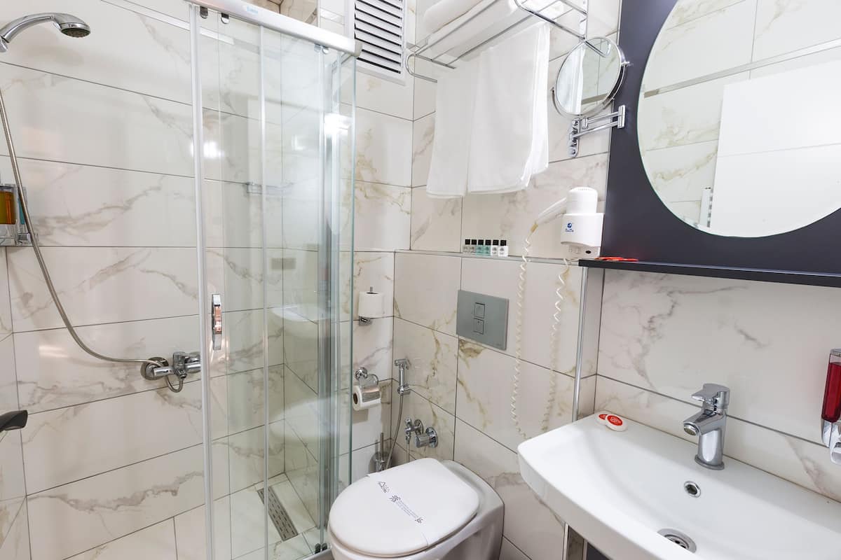 family room, city view | minibar, in-room safe, desk, soundproofing
