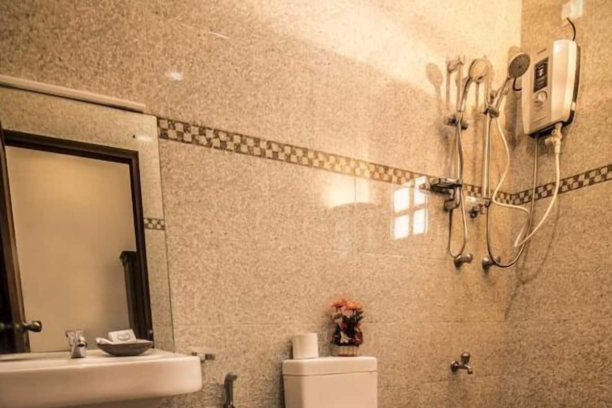 Shower, slippers, towels, shampoo