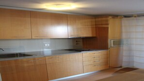 Fridge, microwave, stovetop, cookware/dishes/utensils