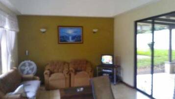 Family House, Multiple Beds, Smoking | Living room | 50-inch plasma TV with satellite channels, TV