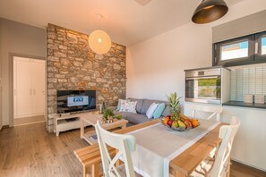 Comfort Villa, Private Pool | Living area | 42-inch flat-screen TV with satellite channels, Smart TV, DVD player
