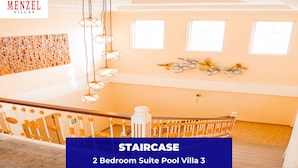 A staircase in a hotel with a modern design, leading to a 2-bedroom suite. - Menzel Villa (Nusa Dua)