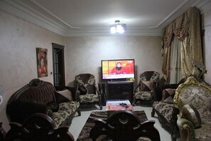 Apartment, 3 Bedrooms | Living room | Flat-screen TV - Pyramid Rise Apartments (Giza)