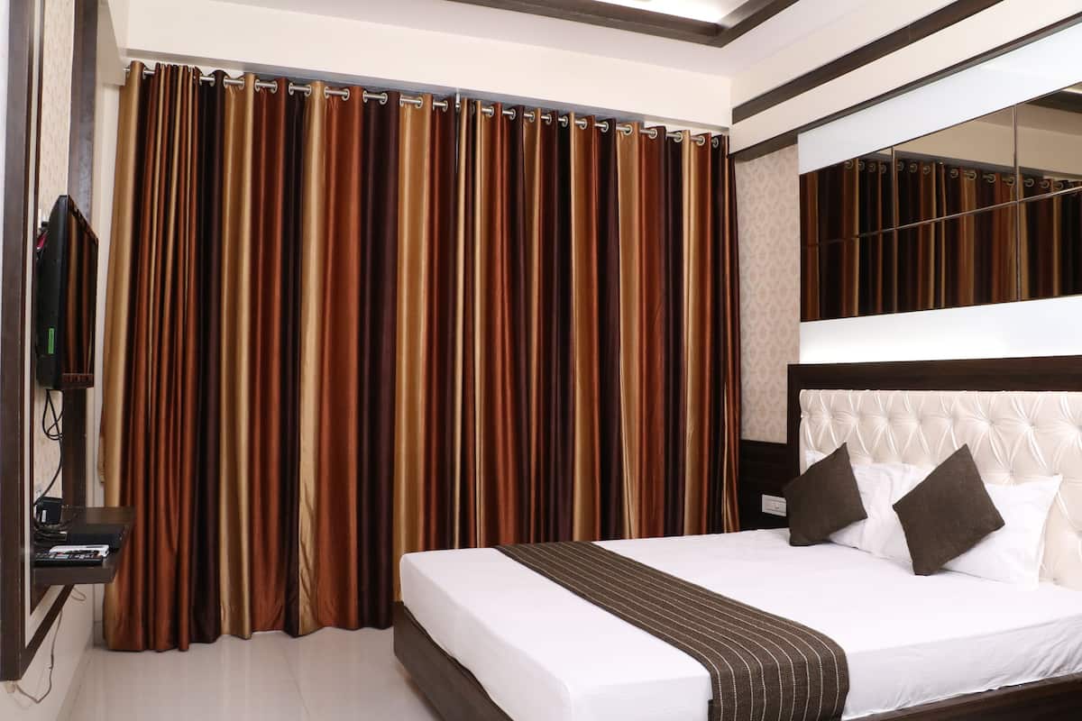 Habitación Deluxe, 1 cama individual grande, para fumadores | Caja de seguridad en la habitación, escritorio y wifi gratis