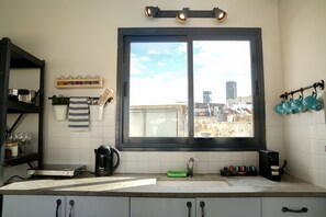 Deluxe Apartment, Non Smoking, Sea View | Private kitchen | Fridge, microwave, stovetop, espresso maker - Penthouse & Sunset (Tel Aviv)