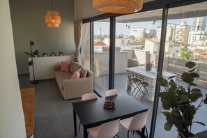 Deluxe Apartment, Non Smoking, Sea View | Living area - Penthouse & Sunset (Tel Aviv)