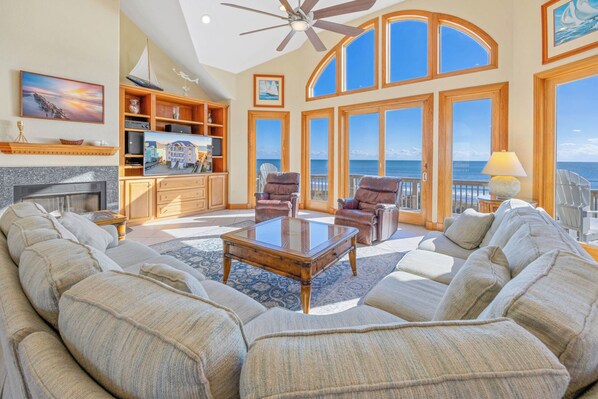 Älytelevisio, DVD-soitin, pöytäjalkapallopöytä, videokirjasto