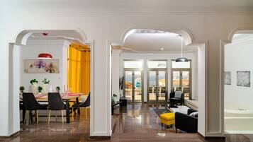Deluxe Villa | Living area | 55-inch flat-screen TV with cable channels, TV, Netflix