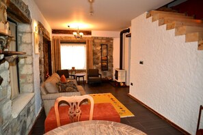 Superior Loft, 1 King Bed with Sofa bed, Non Smoking, Garden View | Living area - Alacati Suites (Cesme)