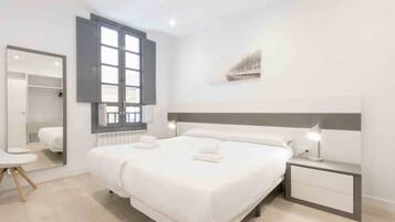 3 slaapkamers, een strijkplank/strijkijzer, gratis wifi, beddengoed