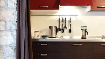 Fridge, microwave, stovetop, coffee/tea maker