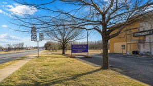 A roadside sign indicating directions to Interstate 84 South and Interstate 180 East. - Extended Stay Snyder (Snyder)