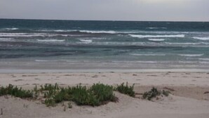 På stranden