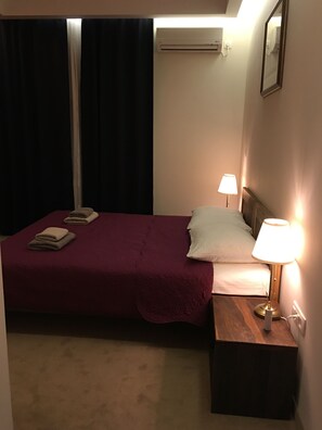 Chambre Deluxe (1) | Fer et planche à repasser, lit de bébé (gratuit)