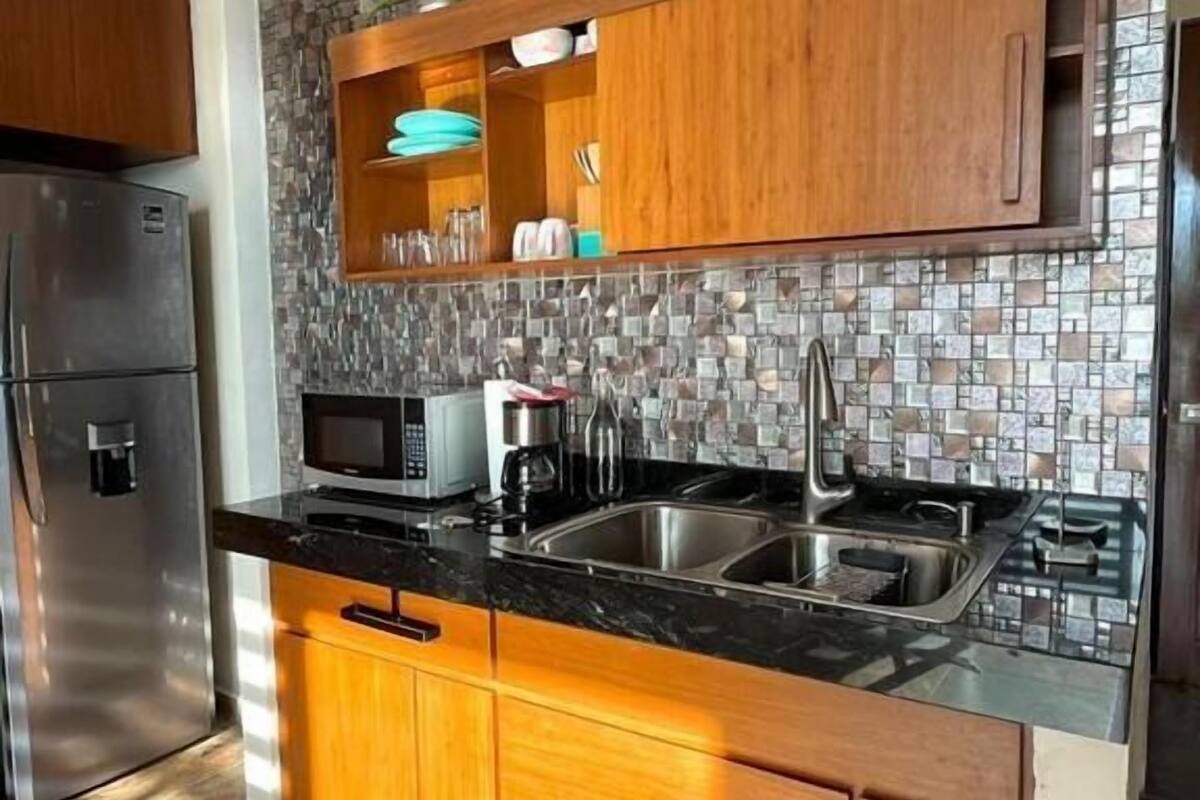 comfort penthouse | private kitchen | fridge, coffee/tea maker, high chair, paper towels