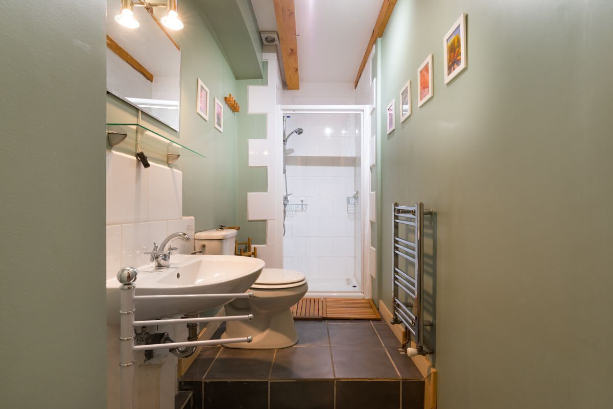 Combined shower/tub, hair dryer