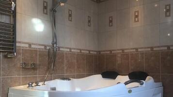 Combined shower/tub, jetted tub, hydromassage showerhead, hair dryer