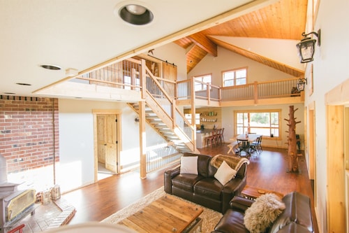 Custom built home on 5 private acres, unobstructed views, and a hot tub. 