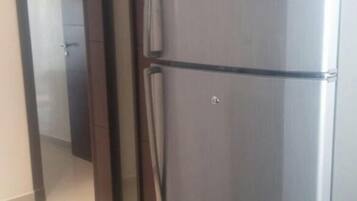 Apartment, Non Smoking, Ocean View | Private kitchen | Fridge, microwave, oven, stovetop