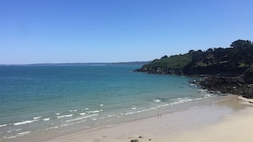 Na praia, toalhas de praia