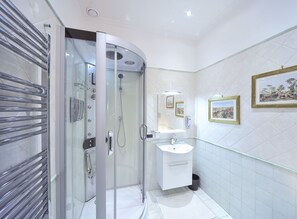 Shower, jetted bath, hair dryer, bidet