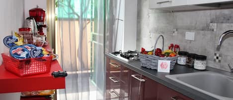 Fridge, microwave, coffee/tea maker, toaster