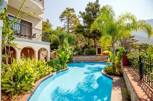 Outdoor pool, open 8:30 AM to 8:30 PM, sun loungers