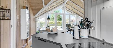 Fridge, stovetop, dishwasher, coffee/tea maker