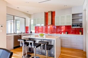 Coffee/tea maker, fridge, microwave, oven