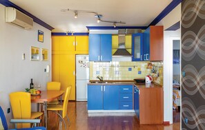 Fridge, stovetop, dishwasher, coffee/tea maker