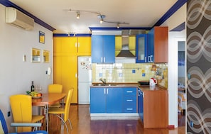 Fridge, stovetop, dishwasher, coffee/tea maker