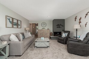 Flat-screen TV, fireplace, video games, DVD player
