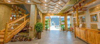 Floral Hotel Fenghuang Huercaowu