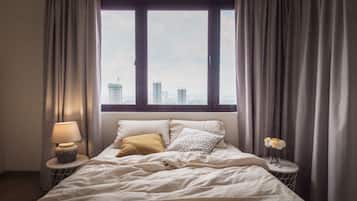 Family Apartment, 2 Bedrooms, Non Smoking, City View | 1 bedroom, individually decorated, individually furnished, desk