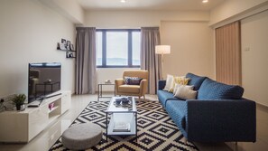 Appartamento Business, 2 camere da letto | Area soggiorno | Smart TV 40 pollici con canali via cavo, TV