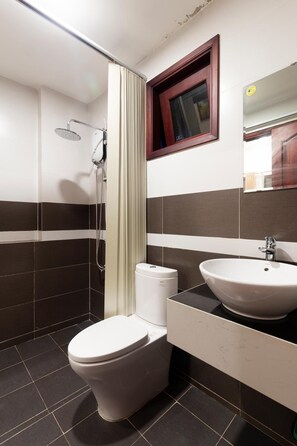 Shower, free toiletries, hair dryer, slippers
