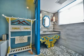 Shower, free toiletries, hair dryer, slippers