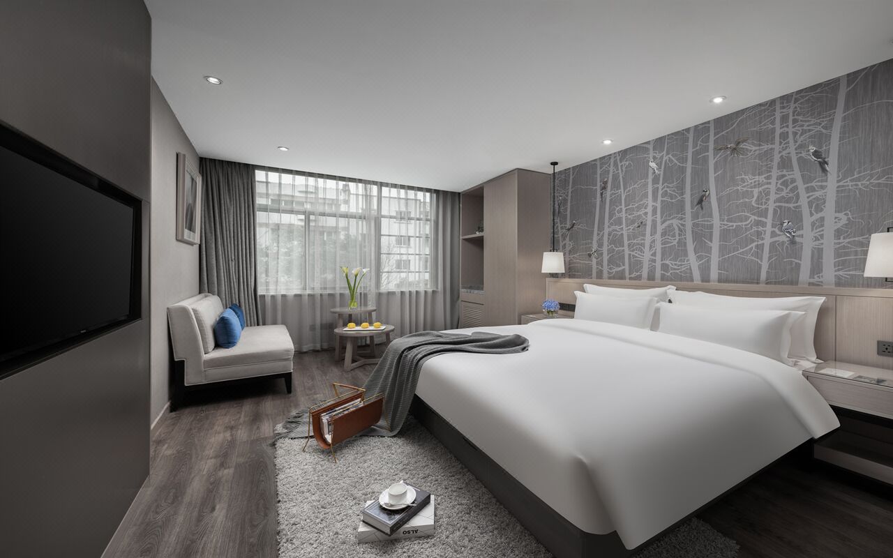 Premium bedding, down duvets, pillow-top beds, free minibar items