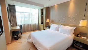 Habitación Deluxe | Ropa de cama de alta calidad, edredón y camas con pillow-top