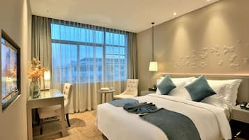 Phòng Junior | Bộ đồ giường cao cấp, chăn bông, nệm có lớp đệm bông