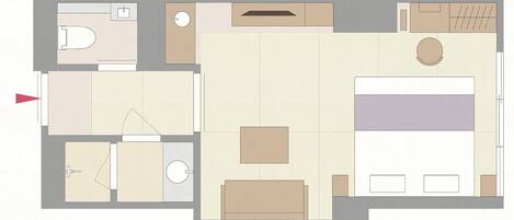 Plano de planta de un hotel con un amplio salón central, un comedor independiente, una cocina, un baño y una pequeña zona de estar al aire libre.