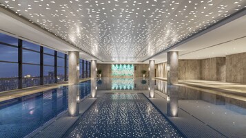 Indoor pool, open 8:00 AM to 10:00 PM, sun loungers, lifeguards on site