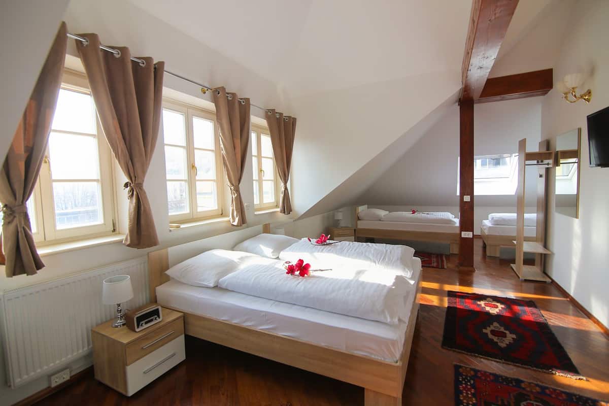 Quadruple Room, Non Smoking | In-room safe, free WiFi, bed sheets