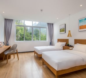 Chambre supérieure avec lits jumeaux | Accès au Wi-Fi (inclus)