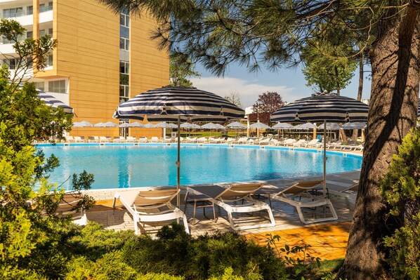 2 outdoor pools, pool umbrellas, sun loungers
