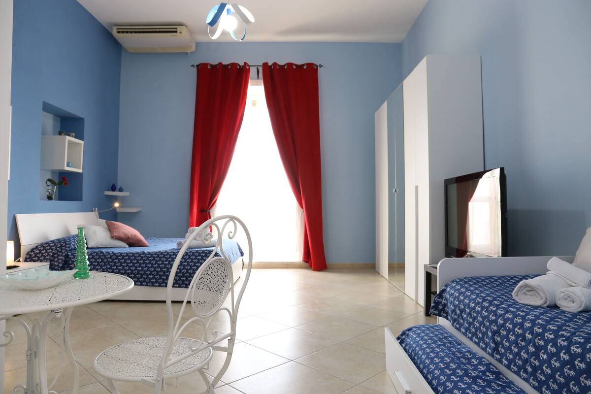 Chambre Quadruple Deluxe | Coffres-forts dans les chambres, rideaux occultants